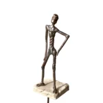 SCULTURA Uomo in bilico di D. Milanesi